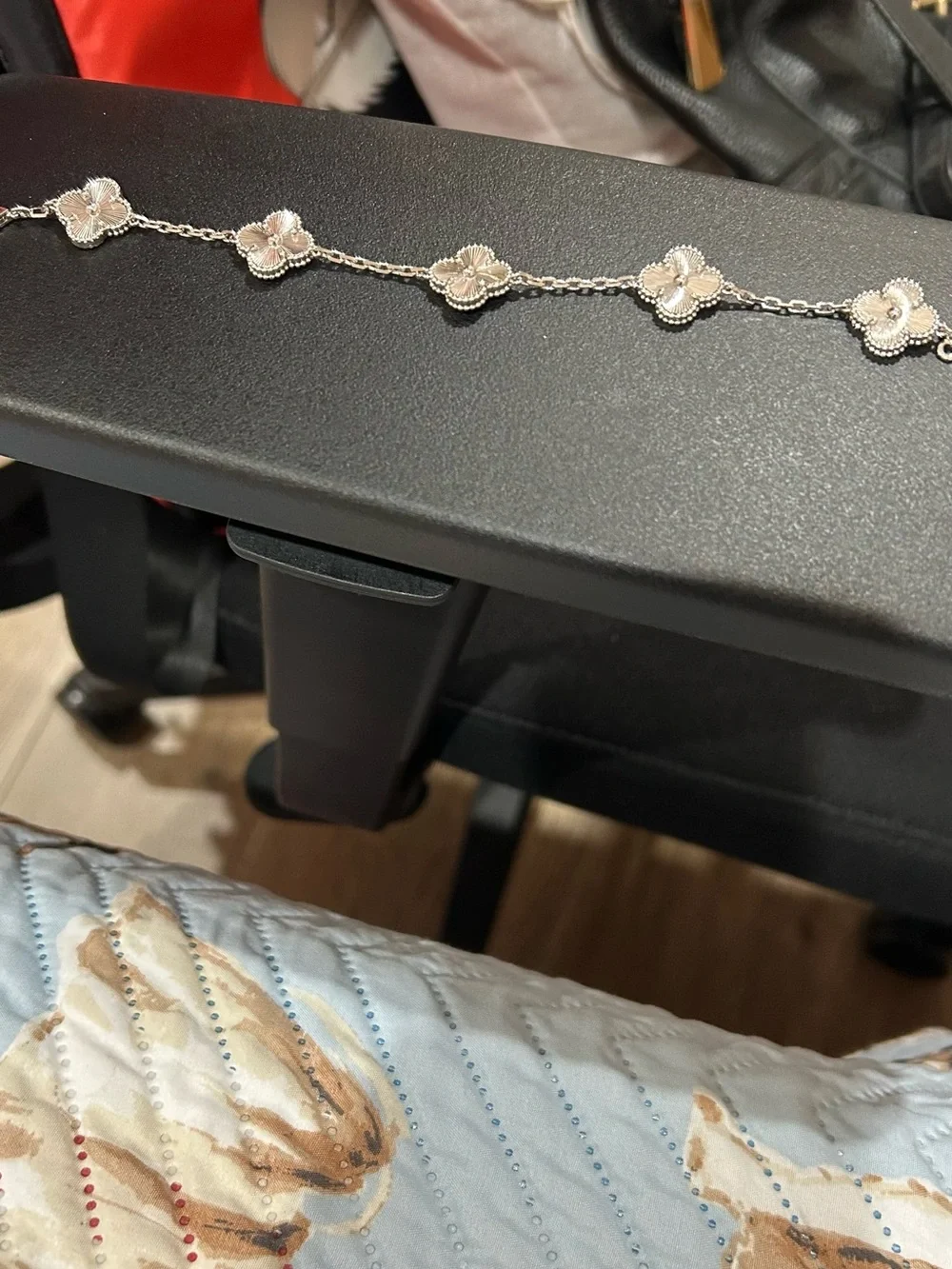 Silver Four-Leaf Flower Link Bracelet with White Accents
